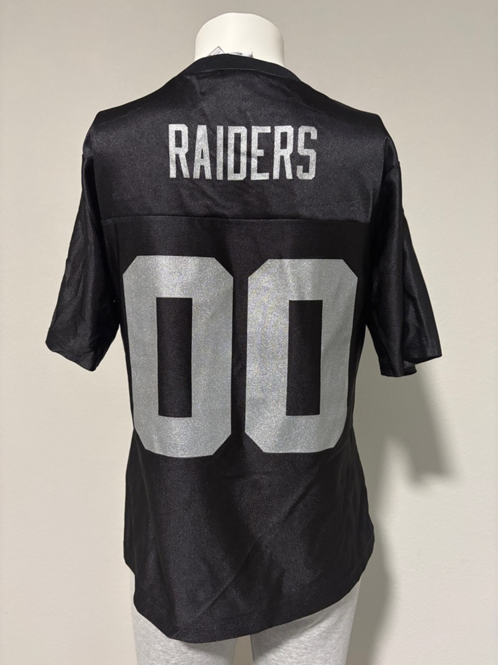 NWOT Medium Raiders Women’s Black and Silver Football Jersey